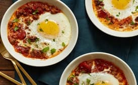 Baked Eggs with Merguez Sausage, Tomatoes, and Smoky Paprika