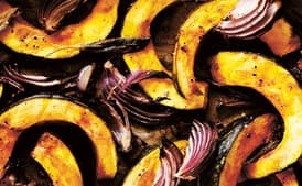 Baked Pumpkin with Lemon, Sautéed Greens, and Toasted Cumin Dressing