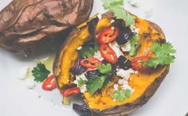 Baked Sweet Potato with Olives, Feta, and Chile