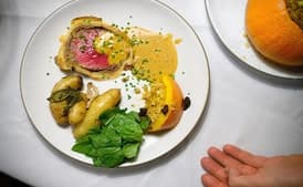 Beef Wellington with Roasted Potatoes and Wilted Greens