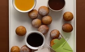 Bomboloni with Chocolate Espresso, Whisky Caramel, and Clementine Sauces