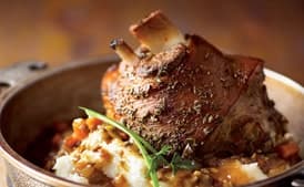 Braised and Roasted Pork Shanks With Prosciutto and Porcini Mushrooms