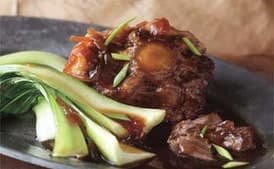 Braised Oxtails with Star Anise and Chinese Greens
