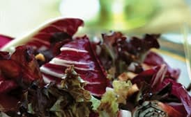 Bronze and Red Lettuce Salad with Serrano Ham and Goat Cheese Spirals