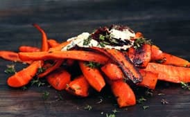Burnt Carrots with Goat Cheese, Parsley, Arugula, and Crispy Garlic Chips