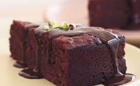 Chocolate-Pistachio Torte with Warm Chocolate Ganache