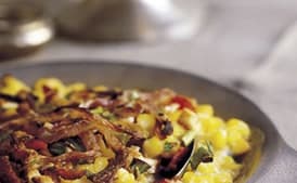 Creamed Corn Gratin with Fried Onion Rings and Bacon