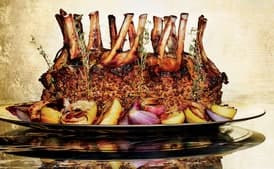 Crown Roast of Pork with Lady Apples and Shallots
