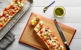 French Bread Pizzas With Ricotta, Roasted Tomatoes, and Pesto