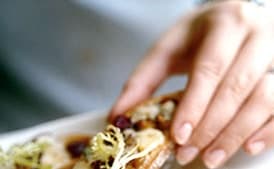 Frisée Salad with Blue Cheese, Walnut, and Cranberry Crostini