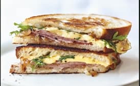 Grilled Ham and Gouda Sandwiches with Frisée and Caramelized Onions