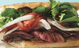 Grilled Steak Sandwiches with Marinated Watercress, Onion, and Tomato Salad