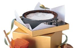 Hot Buttered Rum Cheesecakes with Rum-Caramel Sauce