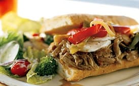 Hot Slow-Roasted Pork, Onion, and Mozzarella Sandwiches