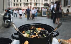 Mussels Steamed in Beer with Crème Fraîche, Herbs, and Parmesan croutons