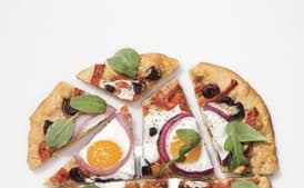 Pizza with Eggs, Roasted Red Peppers, Olives and Arugula