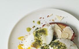 Poached Eggs and Parmesan Cheese Over Toasted Brioche with Pistou