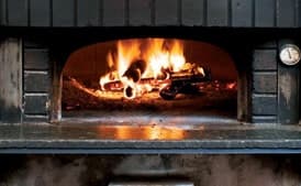 Pork Loin Spiedino with Pine Nut, Garlic, and Currant Soffritto