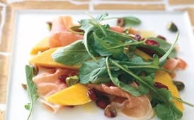 Prosciutto with Persimmon, Pomegranate, and Arugula