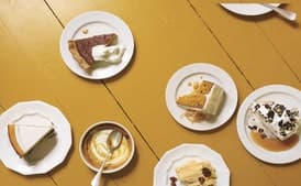 Pumpkin Cheesecake with Marshmallow-Sour Cream Topping and Gingersnap Crust