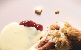 Rhubarb and Raspberry Jam Roly-Poly with Vanilla Custard Sauce