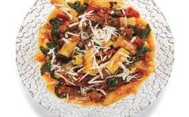 Rigatoni with Spicy Sausage-Tomato Sauce, Arugula, and Parmesan
