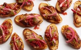 Roast Pork Belly Toasts with Blood-Orange BBQ Sauce and Pickled Red Onion