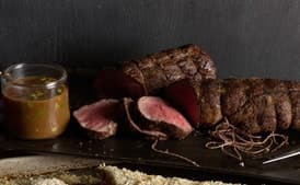 Rosemary-Crumb Beef Tenderloin with Pancetta-Roasted Tomatoes