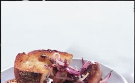 Sausages with Caramelized Red Onions and Radicchio