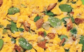 Scrambled Eggs with Leeks, Fava Beans, Crispy Breadcrumbs, and Parmesan