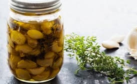 Simple Garlic Confit with Herbs