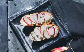 Sliced Baguette with Radishes and Anchovy Butter