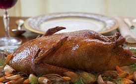 Slow-Roasted Duck with Olive Gravy and Garlic-Fennel Confit