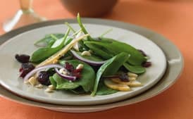 Spinach Salad with Bosc Pears, Cranberries, Red Onion, and Toasted Hazelnuts