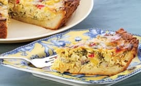 Spring Vegetable Quiche with New Potatoes, Arugula, and Cheddar