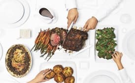 Standing Rib Roast, Spinach-Porcini Stuffing, Irish Whiskey Gravy, and Horseradish Cream