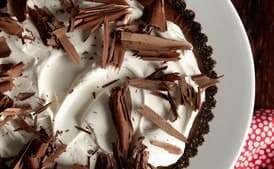 Triple Chocolate Tart with Boozy Whipped Cream