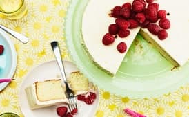 Vanilla-Buttermilk Cake With Raspberries and Orange Cream-Cheese Frosting