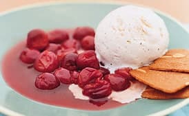 Warm Skillet Sour Cherries with Vanilla Ice Cream