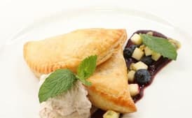 White Chocolate Passion Fruit Turnovers with Blueberry-Mint Sauce and Coconut Cream